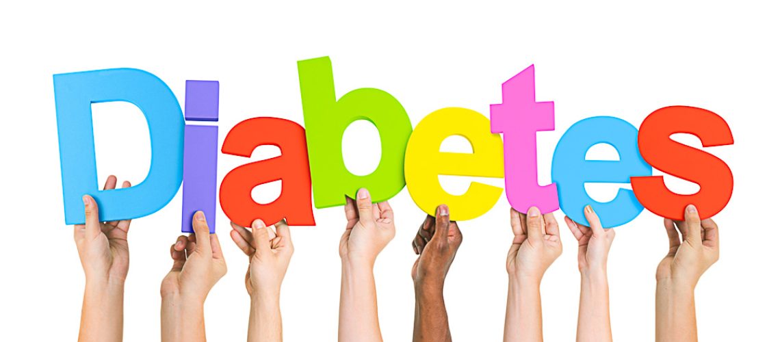 Multi-Ethnic Group Of Diverse People Holding Letters That Form Diabetes